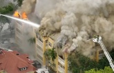 Large fire burns at Miami apartment building where man found shot inside