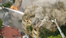 Large fire burns at Miami apartment building where man found shot inside